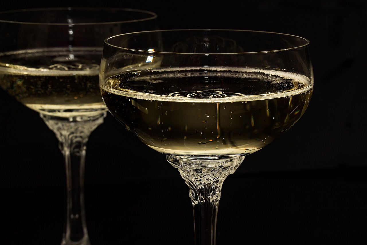 Sophisticated still life of whiskey in a glass against a dark background, capturing the essence of refinement.